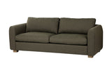 Isolde moss green fabric sofa with rounded arms, three-quarter view
