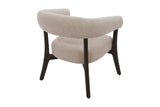 Jolie oat accent chair from behind at an angle, showing the curved back
