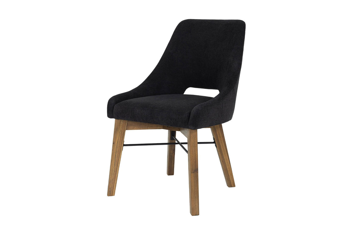Keaton curved dining chair in Graphite Grey fabric with Warm Pecan acacia legs, three-quarter view