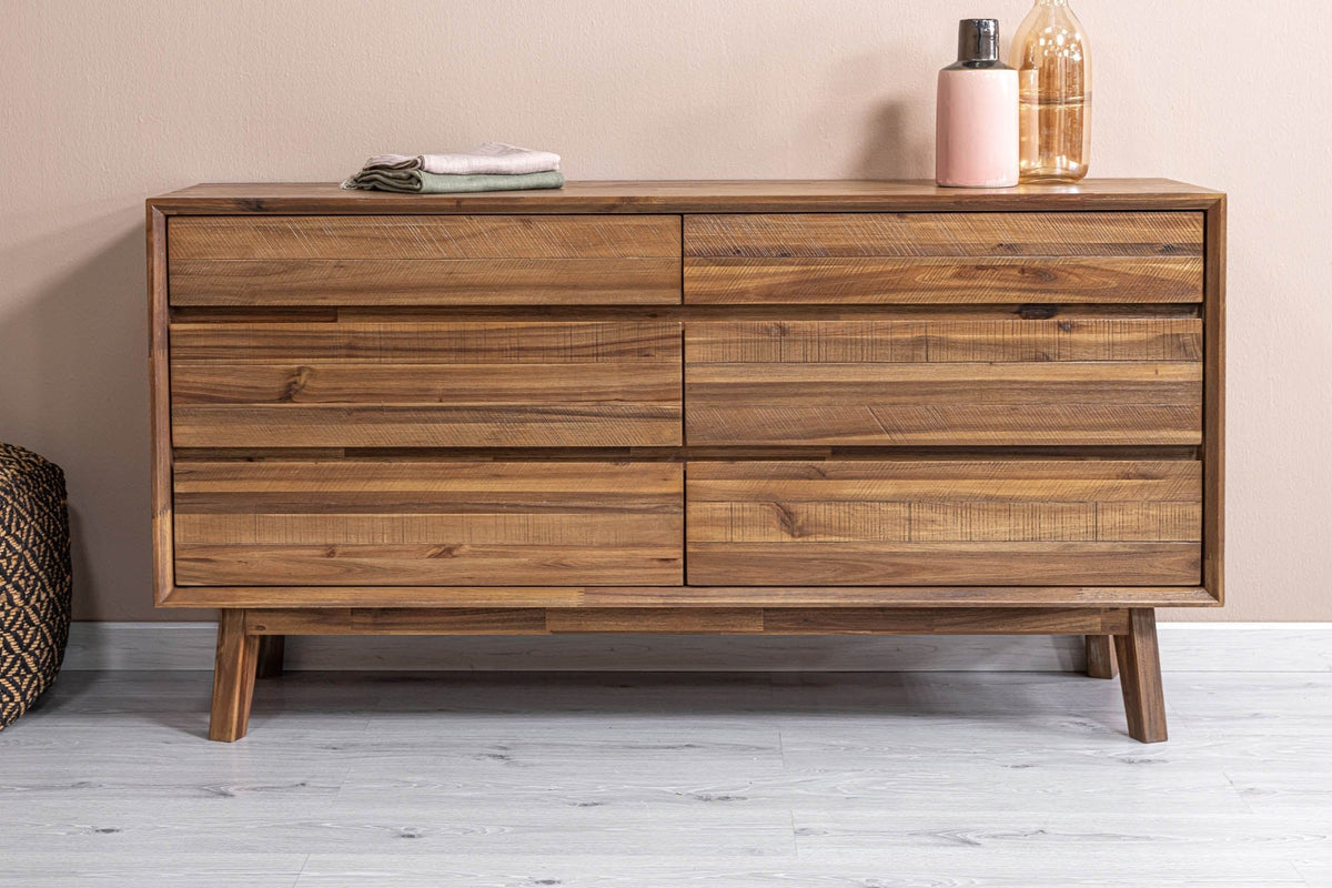 Keaton Warm Pecan dresser against a blush pink bedroom wall