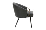 Kenna accent chair side view showing the aged gold arm ring and tapered legs