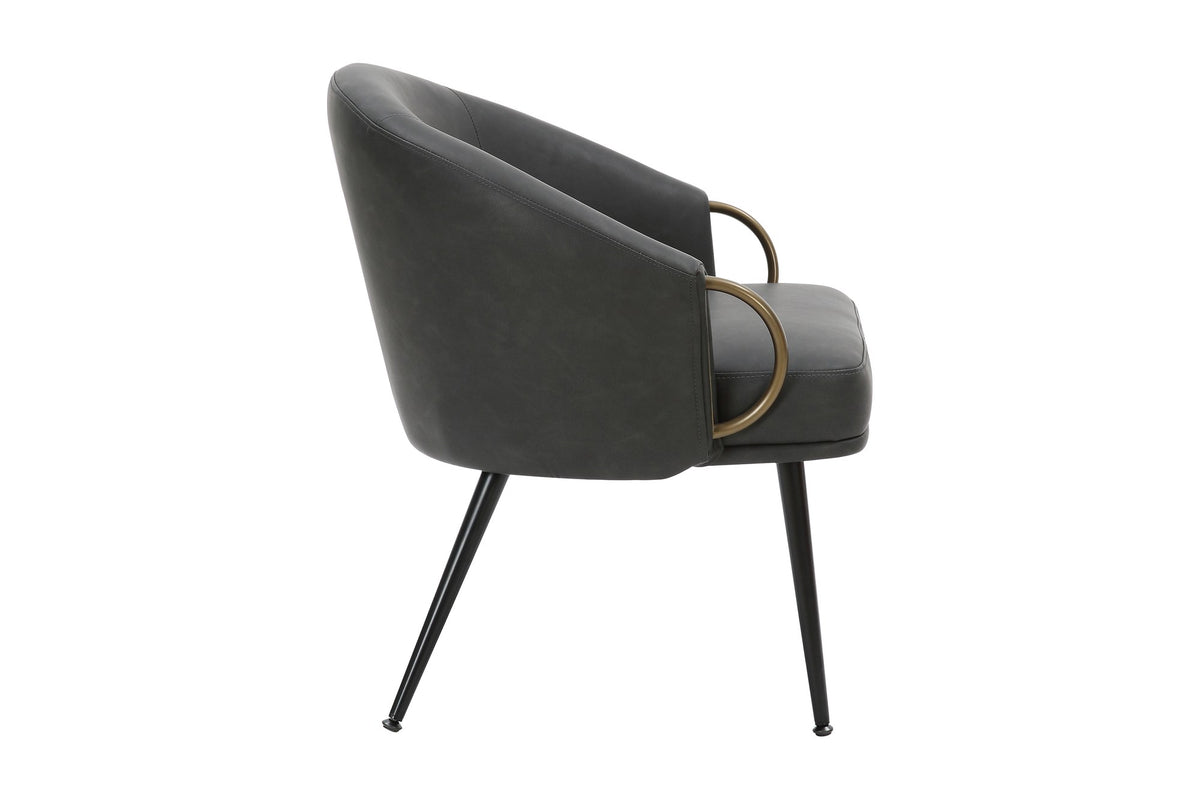 Kenna accent chair side view showing the aged gold arm ring and tapered legs