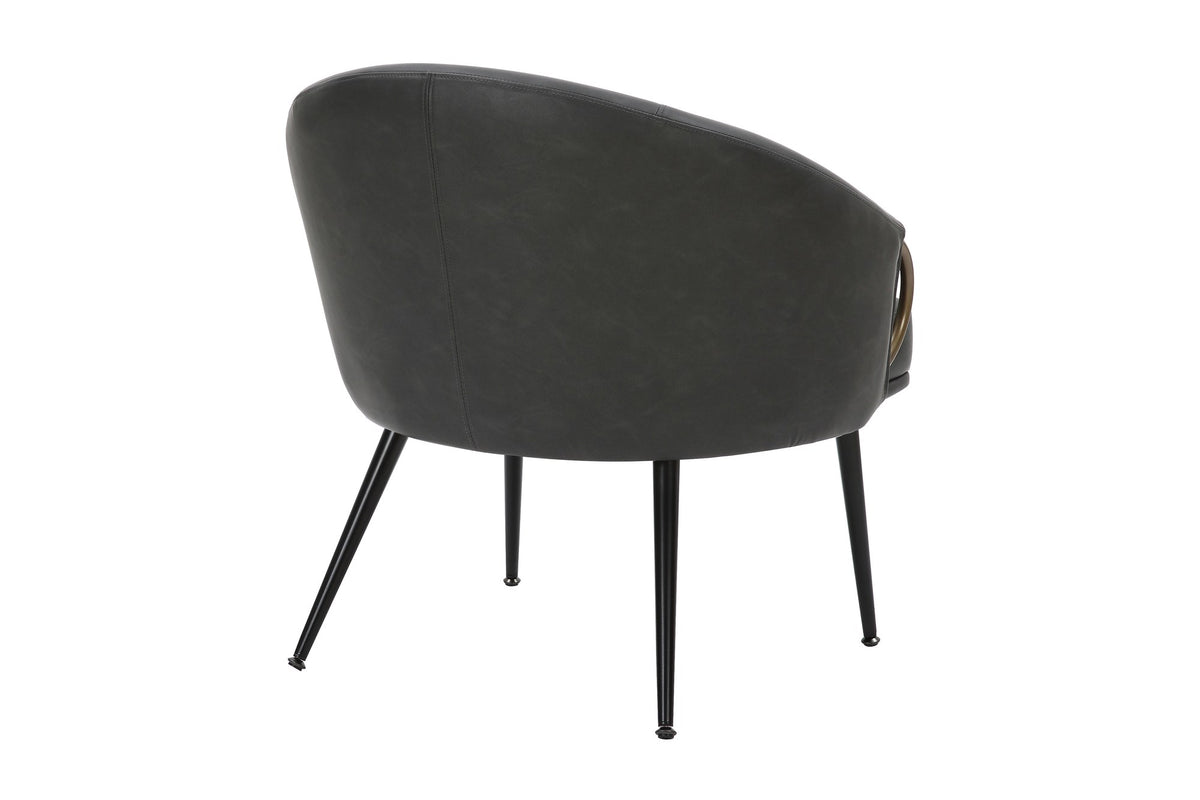 Kenna barrel accent chair from behind, showing the rounded charcoal back