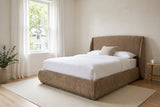 Labro platform bed in dark beige with white bedding in a Montreal Plateau bedroom