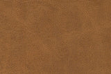 Close-up of the Brown top-grain leather: a fine pebbled grain with darker and lighter patches