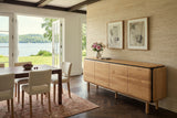 Larino sideboard in Natural and Black against a travertine wall in an Ayer's Cliff house on Lake Massawippi