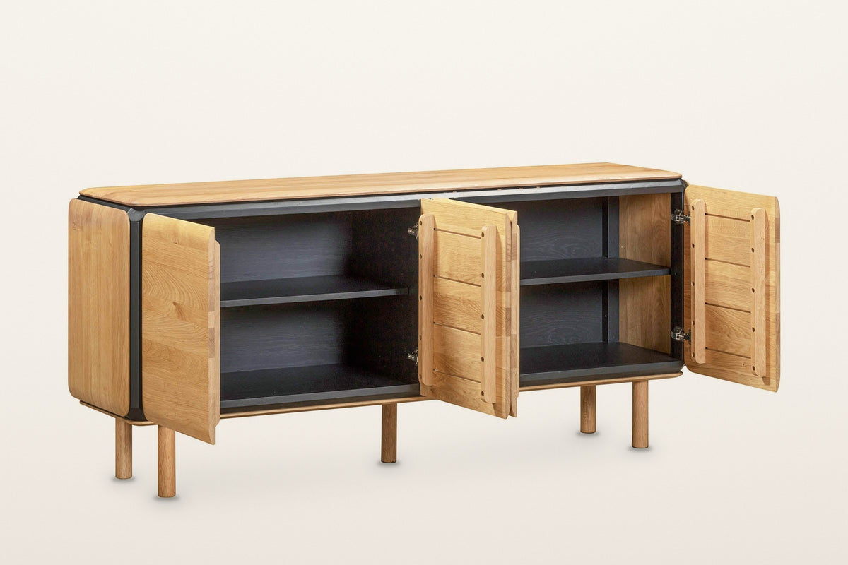 Larino sideboard in Natural and Black with all four doors open on a warm white studio backdrop