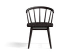 Lauryn dining chair in black oak, seen from the front on a white background