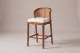 Lazise counter stool in a Walnut finish, three-quarter view on a warm grey studio backdrop