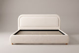 Lerici boucle bed in ivory, straight front view with the slats showing, on a studio backdrop
