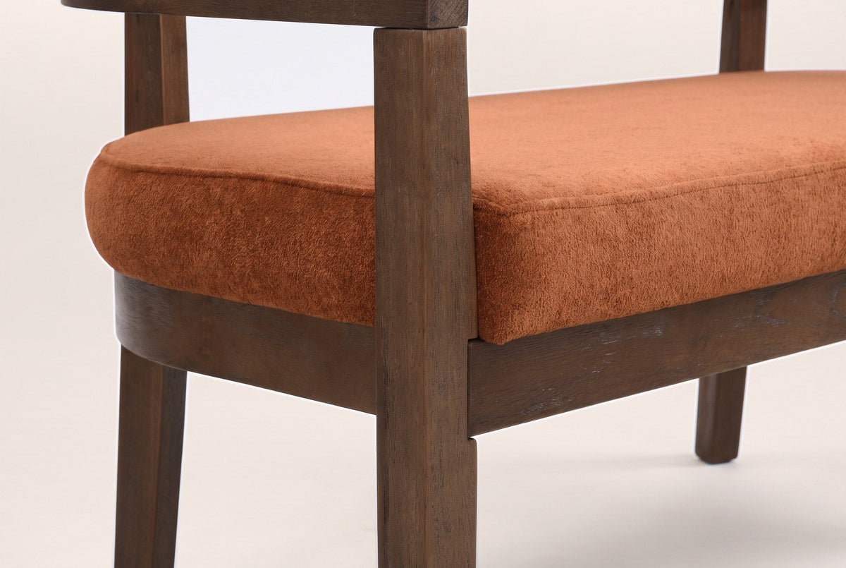 Close-up of the square front leg rising to the arm, the seat rail joint and the seat pad