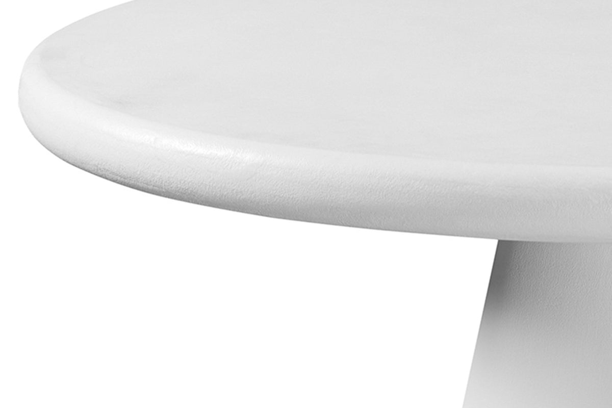 Close-up of a Levico top: the rounded bullnose edge and the fine cement-look texture of the white coating