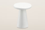 Levico side table seen from above: the thick round white top with its rounded edge over the cone pedestal