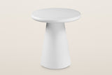 Levico round side table in matte white with a cone pedestal, three-quarter view on a warm light studio backdrop