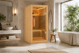 Natural wood 1-person infrared sauna in a modern wellness room