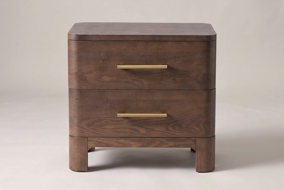 Lodi nightstand in Brown Oak, straight front view: two drawers with brushed-gold bar pulls, rounded corners, four block legs