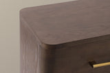 Close-up of the Lodi top corner in Brown Oak: the rounded top slab