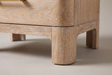 Close-up of a Lodi front leg with its rounded face and the recessed apron meeting it in a curved cove