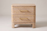 Lodi nightstand in Natural, straight front view: two drawers with brushed-gold bar pulls, rounded corners, four block legs