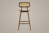 Lovere counter stool in Walnut, straight front view on a studio backdrop