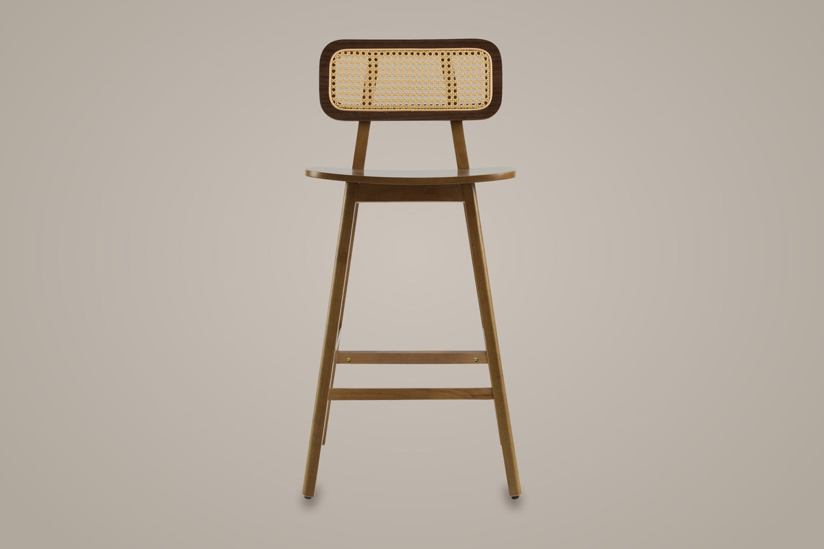 Lovere counter stool in Walnut, straight front view on a studio backdrop