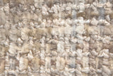 Close-up of the Lowell multi-tone beige fabric with brown and grey flecks