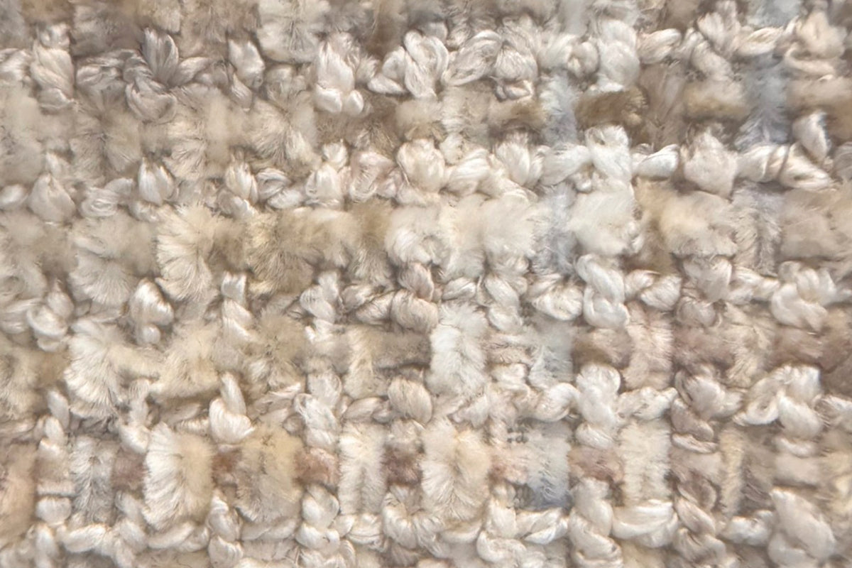 Close-up of the Lowell multi-tone beige fabric with brown and grey flecks