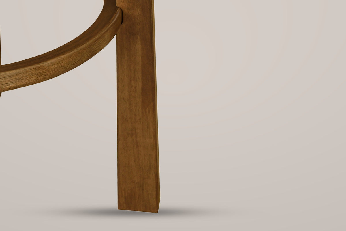 Close-up of a square Dark Walnut rubberwood leg with the curved footrest ring joined to its inner face