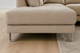 Lucien bisque leather sectional right bumper, back view showing full upholstery