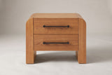 Macerata nightstand in brown, straight front view: two drawers, two slim black bar handles, rounded slab sides