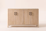 The Maren storage cabinet in Natural seen straight on, with its two pairs of doors and four black bar handles