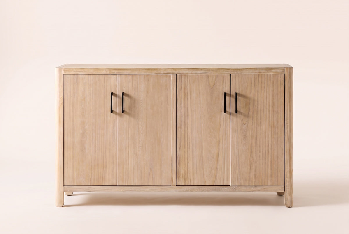 The Maren storage cabinet in Natural seen straight on, with its two pairs of doors and four black bar handles