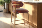 Marlow Tobacco leather counter stool at a wood kitchen island in morning light
