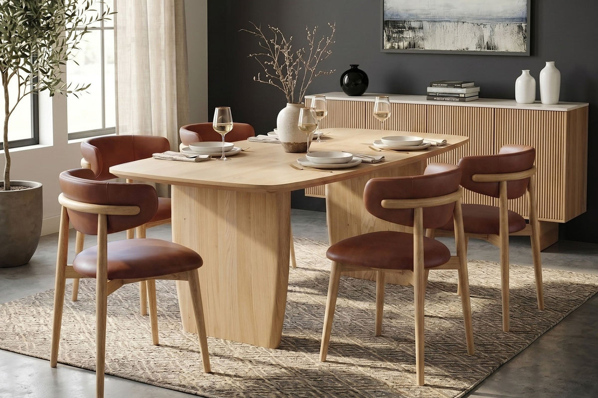 Marlow Tobacco leather dining chairs around a light wood dining table