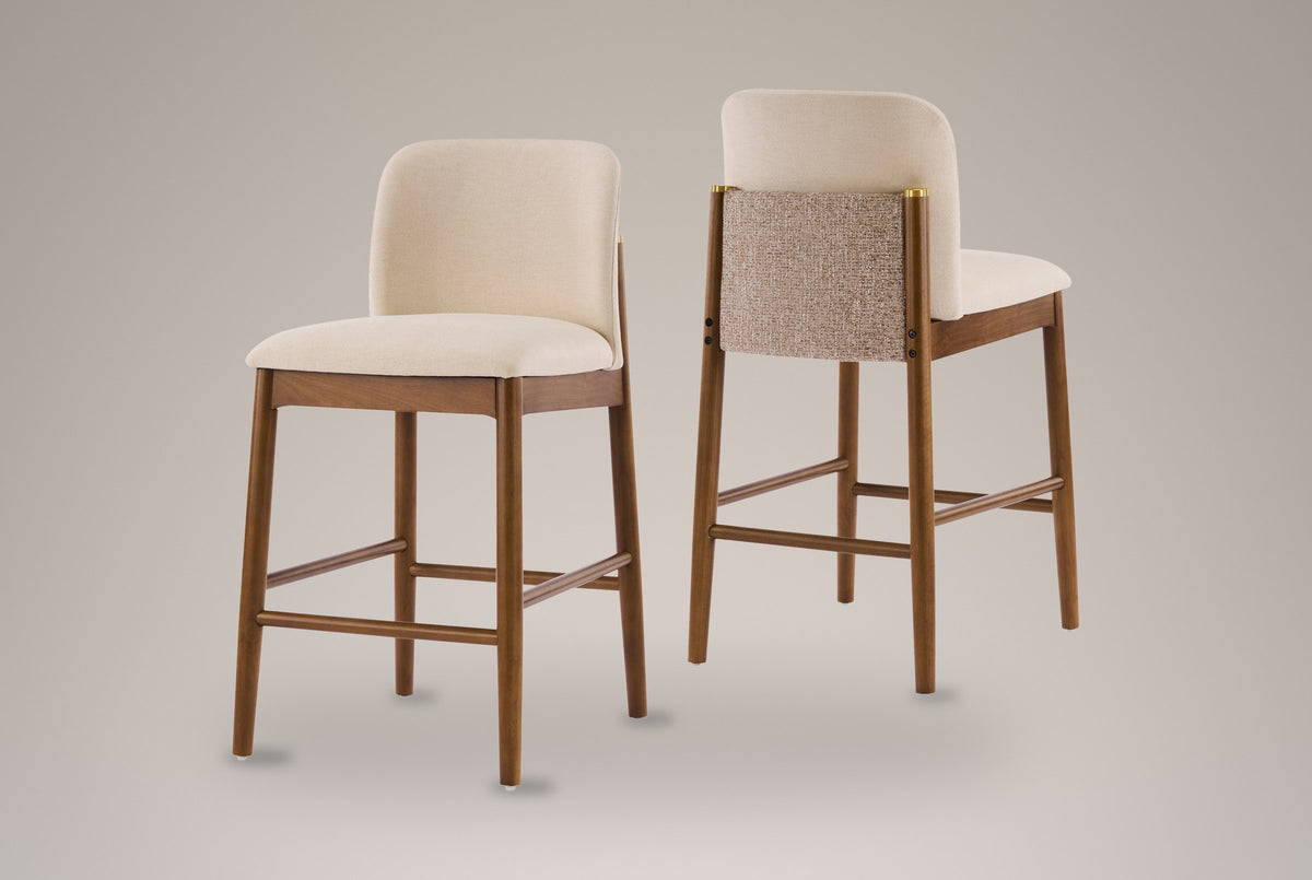 The set of two Menaggio counter stools on a studio backdrop: one from the front