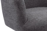 Close-up of the textured warm charcoal fabric on the Miles stool arm and seat