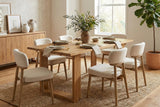 Mireille honey acacia dining table set for six under a woven pendant in a bright dining room