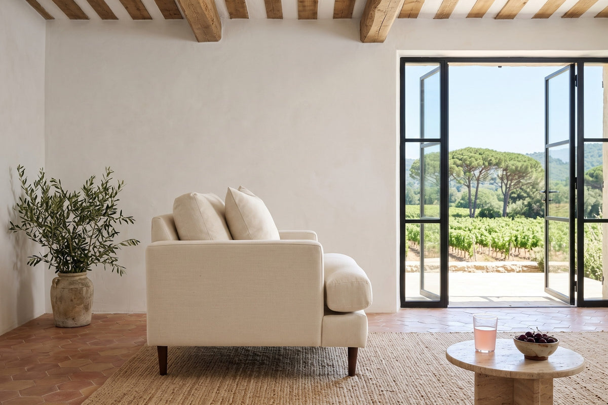 Mombaruzzo accent chair in side profile in a Cotignac farmhouse, with limewash