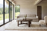Mondavio coffee table in Smoked Acacia in a Kitzbuehel chalet, with whitewashed spruce boards