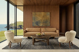 Mondavio coffee table in Smokey Chestnut in a Ferryland house, with walnut panelling, a camel sofa