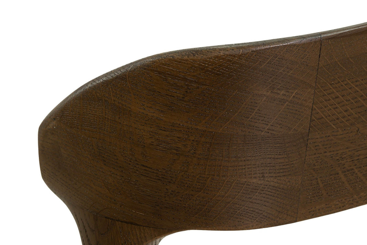 Close-up of the Mondavio back band in Smokey Chestnut: oak grain on the curved band and the sculpted joint where the post mee
