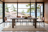 Mondavio dining table in Smokey Chestnut in a Georgian Bay dining room with walnut panelling