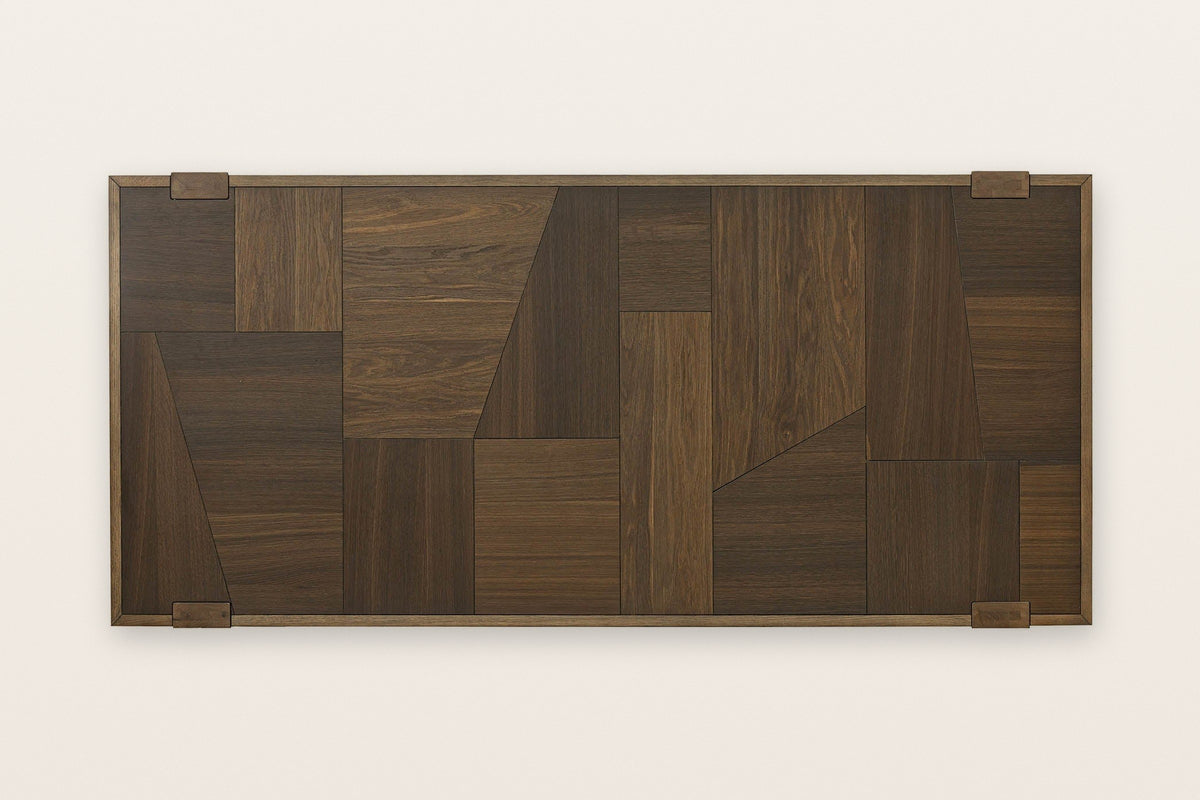 The Mondavio top seen from above in Smokey Chestnut: a patchwork of oak veneer pieces inside an oak frame with mitred corners