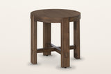 Mondavio round side table in Smoked Acacia, three-quarter view on a warm white studio backdrop: a mosaic top in a thick rim o