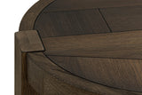 Close-up of the Mondavio top in Smokey Chestnut: a leg's end grain set into the thick rim, beside the oak mosaic