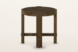 Mondavio round oak side table in Smokey Chestnut on a warm white studio backdrop