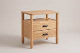 Montagnana nightstand in Light Natural, three-quarter view on a warm grey studio backdrop