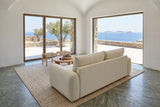 Montecassiano sofa in Cream seen from behind and above in a house on Tinos, with a white lime-plaster vault
