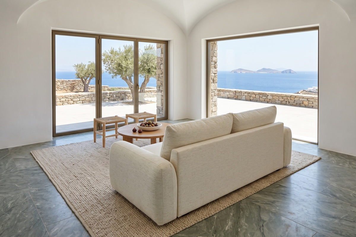 Montecassiano sofa in Cream seen from behind and above in a house on Tinos, with a white lime-plaster vault