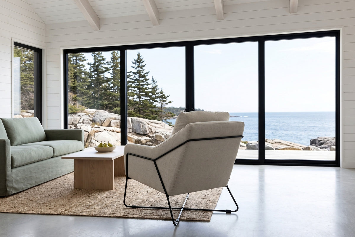 Montelupone accent chair in Taupe seen from behind in a Ketch Harbour house in Nova Scotia